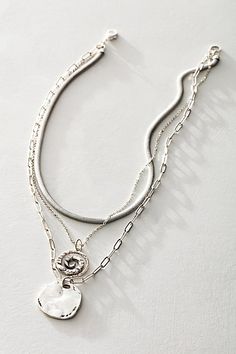 Add a little something extra with this stunning layered necklace featuring a mixture of three different chains accented by naturally-shaped, distressed charm details. * Clasp closure * Fixed length | Oversized Coin Necklace by Free People in Silver Silver Necklace Inspiration, Silver Stack Necklaces, Layered Silver Necklace, Everyday Silver Necklace, Chunky Silver Jewellery Aesthetic, Boho Silver Jewelry, Necklace Stacks Silver, Cool Silver Jewelry, Stacked Silver Necklaces