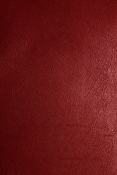 a red leather texture background or wallpaper