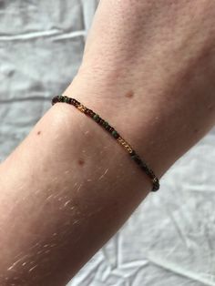 You will receive one dainty minimalist bracelet made of brown toned seed beads with a 24K gold over stainless steal clasp. You can combine it with the DOWN TO EARTH necklace or with others. ☼ N A T U R E  -  I N S P I R E D   J E W E L L E R Y ☼ - DOWN TO EARTH bracelet  - brown beads  - - 24K Gold clasp - >> Shop necklaces in the same colour range: ▪ https://www.etsy.com/NatureBeadJewellery/listing/1361665615/brown-beaded-choker-necklace-double ▪ https://www.etsy.com/NatureBeadJewellery/listing/1351161912/brown-beaded-choker-necklace-minimalist D E T A I L S : ▪ 24K gold over 304 stainless steal  ▪ nickel-free ▪ sustainable packaged ▪ small women owned business ▪ made in Europe The smell of the earth after a rain. You want to take it in with every breath, even if it seems so familiar. Thi Casual Brown Beaded Jewelry, Minimalist Handmade Brown Bracelets, Brown Tiny Beads Necklace For Gift, Everyday Brown Beaded Bracelets, Brown Tiny Beads Bracelet, Brown Beaded Bracelets, Small Beaded Bracelets Diy, Earth Necklace, Bead Buddies