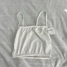 Free People White Crop Top Size Xs/S Condition: Nwt Color: White Details : - Open Back - Extra: - I Ship Between 1-2 Days Basic White Top With Built-in Bra, White Cami Crop Top With Built-in Bra, White Summer Tops With Built-in Bra, Basic Cotton Crop Top, Bra Friendly, White Cotton Crop Top For Everyday, White Cropped Tank Top With Built-in Bra, Summer White Bra Friendly Tank Top, Summer White Bra-friendly Tank Top, White Basic Seamless Tank Top