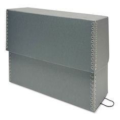 a large gray box sitting on top of a white surface