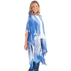 This Linda Anderson Blue Wave ruana can add the finishing touch to any outfit! Whether it's formal, casual, worn with a shirt and jeans, or a blouse with a skirt, this elegant accessory is the finishing touch to any look. This Linda Anderson Blue Wave ruana can add the finishing touch to any outfit! Whether it's formal, casual, worn with a shirt and jeans, or a blouse with a skirt, this elegant accessory is the finishing touch to any look. Lightweight Arm openings Tassel hem World Famous Linda A Trendy Summer Outerwear With Fringe, Trendy Summer Fringe Outerwear, Summer Long Sleeve Poncho With Fringe, Summer Poncho With Fringe, One Size Casual Poncho For Spring, Long Sleeve Fringe Summer Cover-up, Blue Beach Tops With Tassels, Spring Beach Cover-up Duster, Blue Spring Top With Tassel Ties