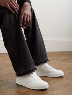 CELINE HOMME's 'CT-07' sneakers are made from white and black leather with durable rubber overlays. Modelled after basketball styles, they're perforated along the toe boxes and sides and finished with signature branded details. Sneakers For Men, Mr Porter, White Style, Sneakers White, Luxury Handbags, Leather Sneakers, Top Sneakers, Fashion News, Calf Skin