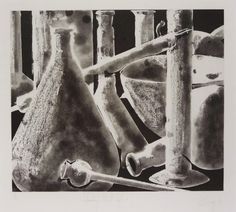 black and white photograph of vases on display