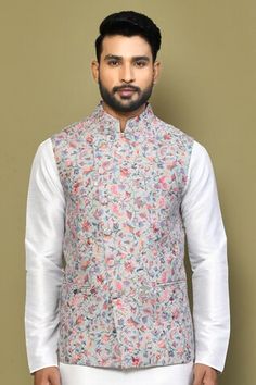 Sea green sleeveless bundi with floral print and stitchline thread embroidery. Paired with white full sleeve kurta and pant. - Aza Fashions Spring Festive Bandhgala With Printed Motifs, Festive Traditional Nehru Jacket With Floral Print, Festive Spring Bandhgala With Printed Motifs, Spring Wedding Nehru Jacket With Printed Motifs, Traditional Spring Bandhgala With Printed Motifs, Traditional Floral Print Bandhgala For Spring, Traditional Spring Bandhgala With Floral Print, Sleeveless Nehru Jacket With Resham Embroidery, Floral Print Nehru Jacket For Festive Occasions