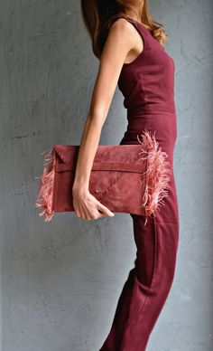 Medusa Clutch in rosewood.An adorable leather clutch with fringes for beautiful fashion looks which comes in two sizes, small and large.This envelope clutch is ideal to carry anything you might need!A handmade clutch from Italian genuine suede leather in rosewood colour and silk fringes.The interior is fully lined with beige leatherette.It closes with one metal rivet stud in silver or gold. The pictures show the clutch with silver stud.Small size comes with a removable leather strap made from th Fringe Evening Clutch In Rectangular Shape, Rectangular Fringe Clutch For Evening, Evening Rectangular Fringe Clutch, Formal Fringe Rectangular Clutch, Luxury Clutch Bag With Fringe, Fringed Clutch Evening Bag, Fringe Clutch Evening Bag, Luxury Fringe Clutch Bag, Chic Rectangular Clutch With Fringe