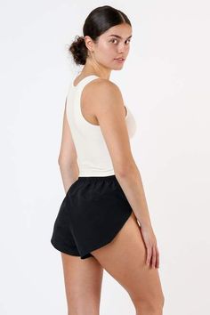 Seamless High Stretch Cotton Activewear, High Stretch Seamless Cotton Activewear, Basic Seamless Tank Crop Top, Ribbed Stretch Short Tops, Ribbed Stretch Short Length Tops, Ribbed Stretch Top, Short Length, Cropped Athleisure Elastane Tank Top, Cropped Elastane Tank Top For Athleisure, Stretch Top With Built-in Bra, Short Length