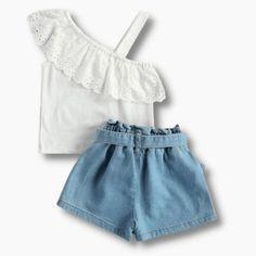 This is such a cool and refreshing outfit for this summer. It features a half off-shoulder with a strap that makes the simple top look very stylish. The detailed lace design will make your little girls stand out in this simple yet stylish outfit. It comes with matching denim shorts. Style it with hat and sandals to complete a summer look. Collar: O-Neck Closure Type: Pullover Model Number: Kid girl outfit Material: Cotton Sleeve Length(cm): Sleeveless Suggested size Suggested Age Top Lenght Bust Denim Shorts Style, Simple Top, Shorts Style, One Shoulder Top, Girl Standing, Shorts Outfit, Stylish Outfit, One Shoulder Tops, Lace Design