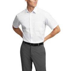 He'll be dressed in style and comfort with this men's Van Heusen poplin short sleeve dress shirt. Click on this MEN'S GUIDE to find the perfect fit and more! He'll be dressed in style and comfort with this men's Van Heusen poplin short sleeve dress shirt. Click on this MEN'S GUIDE to find the perfect fit and more! FEATURES Button front Wrinkle free Cuffed Short sleeve 1 chest pocketFIT & SIZING Regular fitFABRIC & CARE 65% recycled polyester, 35% cotton Machine wash ImportedRESPONSIBLE Tested fo Short Sleeve Business Shirt For Summer, Modern Semi-formal Short Sleeve Shirt, Formal Short Sleeve Shirt With Pockets, Formal Shirt With Pockets And Short Sleeves, Formal Short Sleeve Shirt For Summer, Semi-formal Short Sleeve Cotton Shirt, Office Shirt With Pockets And Short Sleeves, Semi-formal Cotton Short Sleeve Shirt, Classic White Short Sleeve Dress Shirt