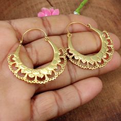 Gold Mandala Earrings- Brass Jewelry- Ethnic Earrings- Indian Jewelry- Hoop Earrings- Bohemian Earrings- Birthday Gifts- Earrings For Women Description : Metal : Brass Plating : Gold Plated Weight : 10.11 Gram Approx ❣❣ Handmade Item ❣❣ **Made to Order** » C U S T O M I Z E O R D E R « All gemstone jewelry is made with silver and brass. If you want to make any changes with this jewelry, then please send us a message. We will make as per your requirements. For more beautiful designs please visit Jewelry Hoop Earrings, Mandala Earrings, Handmade Silver Jewellery, Gold Mandala, Simple Bangle, Earrings Indian, Hammered Earrings, Earrings Bohemian, Ethnic Earrings