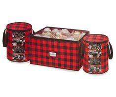 three red and black plaid fabric storage containers with handles, one holding an assortment of items