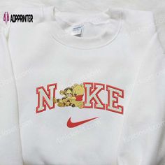 Introducing the Winnie The Pooh and Tiger x Nike Embroidered Sweatshirt, a delightful collaboration that combines the beloved characters with Winnie The Pooh Nike Sweatshirt, Nike Sweatshirts Women, Diy Nike Sweatshirt, Nike Embroidered Sweatshirt, Outfit Styles, Nike Sweatshirt, Disney Sweatshirts, Nike Brand, Embroidered Tee