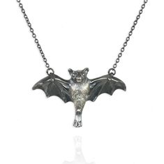 Bat Necklace A super cute bat necklace, sustainably handmade from recycled precious metals. This intricate bat pendant has so many adorable, lifelike features. Check out the sweet face with its wide round eyes, the detailed wings about to open fully, and the tiny pointed feet. And if you're looking for truly unique bat jewelry, we can engrave a meaningful initial or number onto the back of the wings, to create the ultimate personalised bat necklace. Our silver bat necklace comes in either "white Bat Pendant, Bat Jewelry, Bat Necklace, Wax Carving, Round Eyes, Cute Bat, Diamond Guide, Themed Jewelry, Fall Jewelry