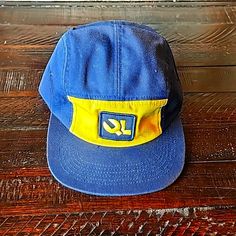 Authentic Quiet Life 5 Panel Camper. Navy Blue With Yellow Gold Front Panel, Ql Sewn On Patch And Nylon Closure Strap. Brand New W/O Tags.. Adjustable Blue Baseball Cap For Camping, Blue Casual Snapback Hat For Outdoor Activities, Adjustable Blue Hat For Camping, Retro Blue Hats For Outdoor, Blue Curved Brim Hat For Camping, Casual Blue Hats For Camping, Casual Blue Hat For Camping, Blue Retro Snapback Hat For Outdoor, Retro Blue Snapback Hat For Outdoor