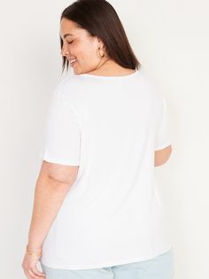 v-neck short sleeves relaxed fit hits below waist models are approx.  5'9" and wear sizes s (4), l (12) and xl (18)Machine wash cold, tumble dry low.  spandex 5% rayon 95% White Cotton Short Sleeve V-neck Top, White Relaxed Fit V-neck Top, Casual White Relaxed Fit V-neck Top, White Cotton V-neck Short Sleeve Top, White Cotton V-neck Top With Short Sleeves, Casual White V-neck Short Sleeve Top, White Relaxed Fit V-neck Short Sleeve Top, Relaxed Fit V-neck Graphic Tee, White Relaxed Fit Short Sleeve Top With Scoop Neck