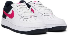 Low-top buffed leather sneakers in white and pink. · Perforated detailing at toe · Lace-up closure · Swoosh embroidered at vamp · Logo patch at padded tongue · Padded collar · Swoosh appliqué at sides · Logo embroidered at heel tab · Mesh lining · Air Sole unit at foam rubber midsole · Treaded rubber sole Please note that this item may be shipped only within North America. Supplier color: White/Dark obsidian/Fierce pink Nike US Size: child's foot length 3.5Y: 8.75 / 22.5 cm 4Y: 9 / 23 cm 4.5Y: 9 Pink Air Force 1, Tenis Air, Pink Nike, Pink Nikes, Nike Kids, Kids Sneakers, Air Force 1, Logo Embroidered, Leather Sneakers