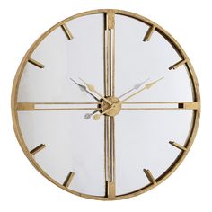 a gold clock with roman numerals on the face