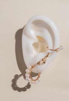 Indulge in luxury with our Maia Pearl Hoops. These handcrafted earrings feature stunning Maia pearls, exuding elegance and sophistication. Elevate any look with these exclusive hoops, perfect for any occasion. Feel like a true fashion icon with Maia Pearl Hoops. Details: Material: 14k Gold-Filled Gemstone: freshwater pearl Handcrafted Water Resistant Hypoallergenic and Tarnish resistant Ear Climber, Climber Earrings, Handcrafted Earrings, Fashion Icon, Jewelry Case, Polish Jewelry, Gold Filled Jewelry, Natural Pearls, High Quality Jewelry