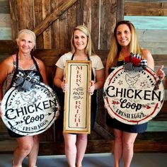 three women holding signs that read chicken and coors