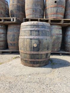 several wooden barrels stacked on top of each other