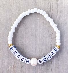 Beach 🐚 Squad Bracelet  Sand. Salt. Sea. 18k gold filled beads, 4mm white seed beads and pearl If you would like another word or color, please put in Personalization Section* and we will message you if we have any questions.  CARING TIPS FOR YOUR JEWELRY ⭐️Treat and store with care. ⭐️ For longevity, avoid exposing your jewelry to water. ⭐️ Avoid having direct contact with lotions, perfumes, sanitizers as these chemicals may cause discoloration of your jewelry. Adjustable White Pearl Bracelet For Beach, Personalized Gold Friendship Bracelets For Beach, White Letter Beads Bracelets For Holidays, Holiday Jewelry With Letter Beads, Holiday Jewelry With Letter Round Beads, Holiday Jewelry With Round Letter Beads, Beach Jewelry With White Letter Beads, White Beach Jewelry With Letter Beads, White Letter Beads Jewelry For Beach