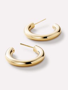 Whether you're dressing up for a night out or adding a touch of elegance to your daily ensemble, these chunky gold hoop earrings are the perfect, solid gold accessory to complement your style. Embrace your inner fashionista and make a bold statement with these striking hoops that exude confidence and charm. It's never been easier to build your solid gold stack! Pair with our Mini Gold Bold C-Hoops. • Bullet point 1The perfect medium sized hoop • Made with 100% recycled, waterproof solid gold • P Chunky Gold Hoop Earrings, Exude Confidence, Mini Gold, Gold Accessories, Letter Necklace, Gold Hoop, Gold Hoop Earrings, Gold Earrings, Solid Gold