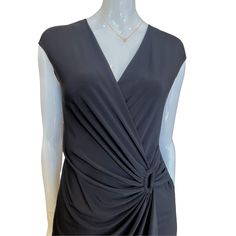 Key Features: Elegant Design: Black wrap dress with a circular cinching detail on the waist for a sculpted body form. Comfortable Fabric: Made from a blend of 96% polyester and 4% spandex, ensuring durability and a comfortable fit. Flattering Fit: Wrap style and cinching detail enhance and sculpt the body's natural shape, perfect for various occasions. Care Instructions: Machine wash in cold water with like colors to preserve the fabric and details. Use mild detergent. Tumble dry low or lay flat Flower Girl Accessories, Girl Christening, Body Form, Black Wrap, Special Occasion Outfits, Shoe Gifts, Dress Shapes, Black Wrap Dress, Outerwear Sweater