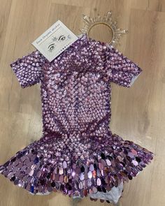 Our adorable reflective festival dress that is the ultimate choice when attending the next festival, party in Ibiza or at the next rave! #festivalfashion #festival #festivaloutfit #raveoutfit #reflective #sequins #dress #partyoutfit Disco Embellished Mini Dress For Club, Disco Style Mini Sequin Dress For Club, Embellished Disco Mini Dress For Club, Disco Style Embellished Mini Dress For Club, Glamorous Summer Club Sequin Fabric, Embellished Fitted Disco Mini Dress, Glamorous Sequin Fabric For Summer Clubbing, Glamorous Sequin Fabric For Summer Club Events, Glamorous Sequin Fabric For Summer Club Wear