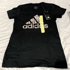 Brand New With Tags Adidas T-Shirt Cheap Adidas T-shirt For Sports Events, Trendy Adidas T-shirt With Letter Print, Adidas Black T-shirt With Letter Print, Adidas Casual T-shirt With Graphic Print, Casual Adidas T-shirt With Graphic Print, Adidas Graphic Tee With Logo Print, Adidas Graphic Tee With Letter Print, Adidas Short Sleeve T-shirt With Letter Print, Adidas Short Sleeve T-shirt With Graphic Print