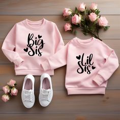 Personalized Big Sis Lil Sis Shirts, Little Sister Sweatshirt, Custom Family Matching T-Shirt, Sisters Tee, Sisters Pregnancy Announcement 🌟 WELCOME TO MODE PARAGON! 🌟 🤗 Are you in search of delightful, personalized, and cozy outfits for your loved ones? You're in the right place! 🌈✨ At Mode Paragon, we prioritize customer service and are here to assist you every step of the way. If you have any questions, don't hesitate to reach out - we're always ready to respond promptly! 💖 🛍️ ORDERING Pink Long Sleeve T-shirt With Letter Print, Basic Long Sleeve Pink T-shirt, Pink Long Sleeve T-shirt With Name Print, Matching Letter Print Cotton Top, Matching Cotton Tops With Letter Print, Matching Pink Tops With Letter Print, Pink Matching Tops With Letter Print, Pink Tops With Letter Print, Cute Long Sleeve Tops With Text Print