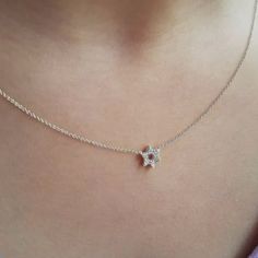 This is a pre-order item and will ship within 7-10 business days. The hint of sparkle, the diamonds and gold lay softly on your chest. This dainty Star of David necklace is ideal for anyone looking to add a pop of sparkle and a pendant full of love, hope, and faith. 14k goldSet with 6 full cut diamonds weighing .06ct total weight 16" chain with 2" extender Choose from white, rose, or yellow gold Star Pendant Size: 1/4" Gold Star Pendant, Star Of David Necklace, Tiny Star, Full Of Love, Diamonds And Gold, Star Of David, Gold Star, Star Pendant, White Rose Gold