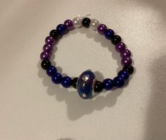 Super cute galaxy bracelet! Very stretchy perfect for tweens! Purple and blue colors and charm with glitter! Galaxy Bracelet, Studio City, Favorite Jewelry, Blue And Purple, Jewelry Bracelets, Super Cute, Accessory Gift, Beaded Bracelets, Blue Color