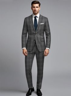 Enhance your wardrobe with our distinguished Noble Dark Gray Check Wool Silk Linen Suit. Meticulously crafted from a refined blend of wool, silk, and linen, exudes sophistication with its captivating dark gray hue and eye-catching plaid pattern. It envelops you in supreme comfort, providing a gentle touch against the skin and an impressive drape that harmonizes effortlessly. Whether you find yourself at a relaxed dinner or a crucial professional meeting, opt for this suit to guarantee not only a Tailored Plaid Suit, Plaid Suits For Semi-formal Occasions, Semi-formal Plaid Suit, Plaid Semi-formal Suit, Timeless Plaid Suit With Notch Lapel, Timeless Plaid Suits With Notch Lapel, Timeless Fitted Plaid Suit, Fitted Timeless Plaid Suit, Tailored Gray Suit For Office Wear