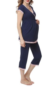 A supersoft pajama top is designed to adapt to your changing body during and after pregnancy with a flattering surplice neckline and Empire waist. A hidden layer along the neck can be pulled aside for easy and discreet nursing. Comfy capri-length pants complete the set. 28" top length; 20 1/2" inseam; 16 1/2" leg opening; 15 1/2" front rise; 17 1/2" back rise Top has surplice V-neck; cap sleeves Pants have elastic/drawstring waist Unlined 95% rayon, 5% spandex Machine wash, tumble dry Imported Spring Nursing Friendly Sleepwear, Spring Maternity Nursing Friendly Sleepwear, Nursing-friendly Sleepwear For Spring, Maternity Nursing Pajamas, Nursing Pajamas, Nursing Maternity, Maternity Sleepwear, Maternity Pajamas, Soft Pajamas