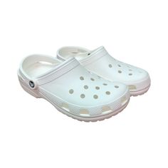 Comfortable And Stylish, The Crocs Classic Clog Is A Must-Have In Your Closet! It Features Light Construction And A Pivoting Heel Strap For A Secure Fit. Water-Friendly And Lightweight, This Clog Is Easy To Clean And Dries Quickly. It’s Perfect For Daily Activities. Crocs Mary Jane, Fuzzy Sandals, Platform Crocs, Shoes Crocs, Crocs Classic Clogs, Toe Post Sandals, Women's Crocs, Pink Sandals, Womens Ballet Flats