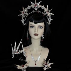 Bloodlust Beautiful vampire themed set consiting of ornate halo design with large bat wings centred with a red blood drop and your choice of add ons: -Glasses chains -nail claws -brooch/clip -Necklace and earrings -Comb DETAILS: Full set includes- Halo, glasses chain, brooch, comb,10 rings, necklace and earrings -No Glasses Chain- All the above minus the glasses chain -Accessories=necklace and earrings combined Most popular choices are shown in the variation section however any other variations Gothic Costume Hats And Headpieces For Cosplay, Fantasy Crown Costume Accessories For Cosplay, Fantasy Crown For Cosplay, Gothic Headpiece For Costume Party, Mystical Crown Headpiece For Masquerade, Fantasy Crown Costume Accessory, Gothic Crown Costume Accessories For Cosplay, Mystical Halloween Cosplay Headpieces, Halloween Masquerade Crown Costume Accessories