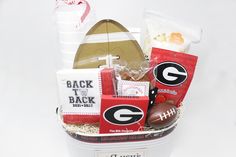 a football gift basket filled with snacks and treats