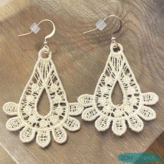 Beautiful embroidered white lace earrings by JOHANNIKA for that special bride! Our whimsical drop earrings come with a silver plated ear wire. They are lightweight and comfortable to wear and include a plastic backing for added security. They can be hand washed and not lose their shape! These romantic JOHANNIKA earrings come in a beautiful presentation and can include a special message. Matching necklace is also available - feel free to contact us. White Filigree Bridal Earrings For Wedding, Ornate White Filigree Earrings, Ornate Nickel-free Wedding Earrings, White Bohemian Filigree Earrings, Baby Girl Crib Mobile, Ornate Nickel-free Chandelier Earrings For Wedding, Bride Wedding Jewelry, Earrings For Bride, Floral Nursery Decor