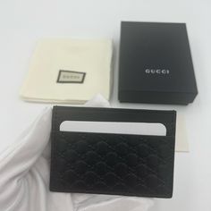 Brand New Authentic Gucci Black Leather Micro Gg Guccissima Embossed Card Case Wallet Style # 262837 Made In Italy Finest Black Calfskin Leather Embossed With Gg Length: 4 In Height: 2 3/4 In 2 Credit Card Slots On Each Side With Deep Compartment In The Middle Gucci Logo & Number Embossed Inside Comes In Gucci Box, Dust Bag And With Authenticity/Care Cards. Classic Gucci Wallets With Interior Card Slots, Gucci Rectangular Wallet With Rfid Blocking, Gucci Luxury Wallets With Rfid Blocking, Designer Gucci Wallet With Rfid Blocking, Gucci Luxury Wallet With Rfid Blocking, Classic Gucci Wallets With Card Slots, Luxury Gucci Wallet With Rfid Blocking, Modern Black Gucci Wallet, Gucci Black Wallet With Card Slots