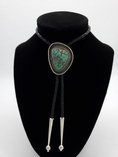 "Stunning Kingman turquoise Bolo Tie. i love the \"picture frame\" design. This piece features a gem grade Kingman Turquoise cabochon, set in sterling. Simple and timeless, this will certainly make a statement.  All of the turquoise chosen for my bolo ties is absolutely some of the best old stock that can be found. Always priced fairly to ensure value, these are heirloom caliber stones. All acquired from the J. Julian estate collection." Picture Frame Design, Turquoise Bolo Tie, Western Bolo Tie, Turquoise Necklaces, Georgetown Tx, Picture Frame Designs, Turquoise Jewelry Native American, Bolo Ties, Dope Jewelry