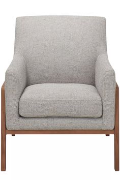 a light gray chair with wooden legs