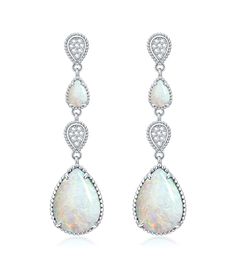 PRICES MAY VARY. Opal & Moissanite :Using beautiful opal and moissanite stone,smooth and sparkly, combined with exquisite hemming technology, to create a gorgeous and delicate gemstone earrings 925 Sterling Silver:Made of solid 925 sterling silver, the outer layer plated with white gold to ensure the comfort of wearing 。The dainty silhouette complements the oval shape of the gemstone, and the vintage vibe adds style to your everyday look. Amazing Gift for Her:Come with our dark green delicate gi Blue Stones Jewelry, Pink Opal Earrings, Opal Drop Earrings, Turquoise Earrings Dangle, Synthetic Opal, Moissanite Earrings, Green Jewelry, Drop Dangle Earrings, Earring Jewelry