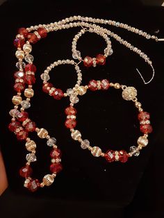 24 inch gold plated necklace with Red &clear glass crystals and gold spacers. The set comes with bracelet and earrings to match. Great for everyday wear or formal event 🥰 Bamboo Earrings, Red Crystals, Gold Plated Necklace, Magnetic Clasp, Formal Event, Jewelry Set, Blue Sapphire, Jewelry Sets, Pearl Necklace