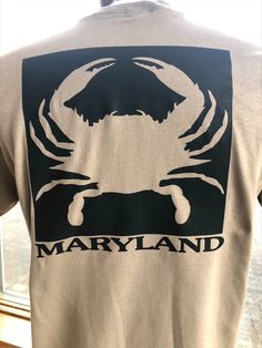 This is a sign that you need a new t-shirt!  Large crab image on back with MARYLAND underneath.   Small crab image on front left. Choose your shirt color and size (men's sizes). Crab T Shirts, Crab Shirt, The Crab, Star Shirt, A Sign, New T, Shirt Color, On Back, Maryland