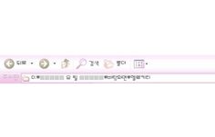 the back side of a pink plastic ruler with different symbols and numbers on each side