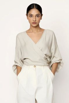 V-neck Wrap Blouse - Natural – LAUDE the Label Boyfriend Trousers, Sustainable Knitwear, Broad Shoulders, End Of Season Sale, Organic Linens, Neck Wrap, Wrap Blouse, Day To Night, V Neck Blouse