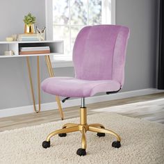 a purple office chair sitting on top of a white rug in front of a window