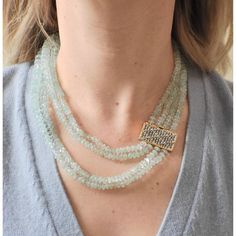 18k gold multi strand necklace by Mario Buccellati, with 5 - 13.5mm aquamarine beads and approx. 0.30ctw Si/H diamonds on the clasp. DESIGNER: Buccellati MATERIAL: 18k Gold GEMSTONES: Diamond, Aquamarine DIMENSIONS: Necklace is 18.5" long (shortest strand), clasp measures 35mm x 18mm. MARKED/TESTED: 750, M. Buccellati, Italian mark, Italy. WEIGHT: 165 grams. CONDITION: Previously Owned, Excellent Condition. Aquamarine Beads, Multi Strand Necklace, Stunning Jewellery, Strand Necklace, Multi Strand, Bead Necklace, Aquamarine, Gold Diamond, Mario