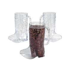 two glasses and one mug are sitting next to each other