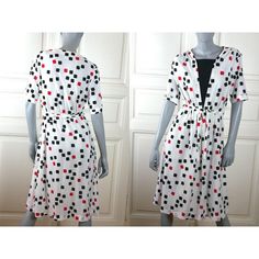 This 1980s Finnish vintage short-sleeve summer dress has a beautiful white, black, and red geometric pattern that looks like stylized playing cards. The stunning lightweight slip-on dress has a square neckline, and the bodice has a deep V black front panel and is gathered at each shoulder. A material belt is attached at the fitted waistline, allowing you to tailor the dress as you want. Condition: Excellent (Professionally Cleaned ... soft and supple, with no stains, tears, wear spots, or weakne